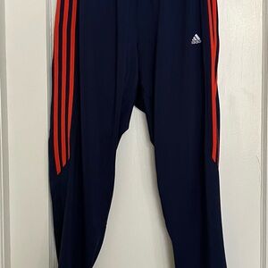 Adidas Womens’ Navy and Orange Climalite track pants. Size XL.
